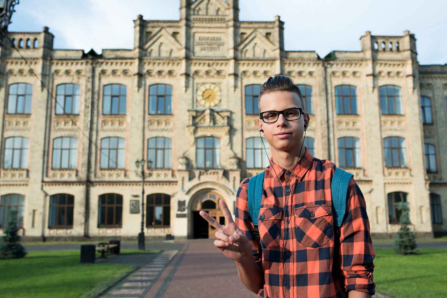Boy in front of University